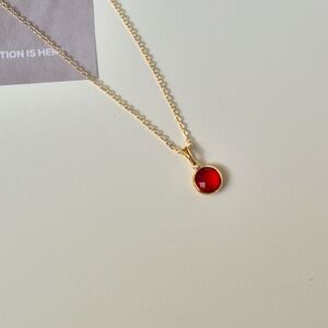 Gold Necklace With Red Pendant